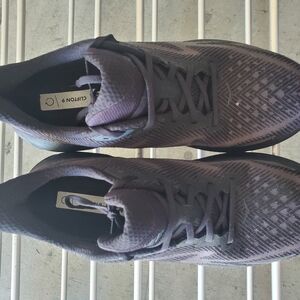 Hoka Black Athletic Shoes with Streamlined Design and Cushioned Support